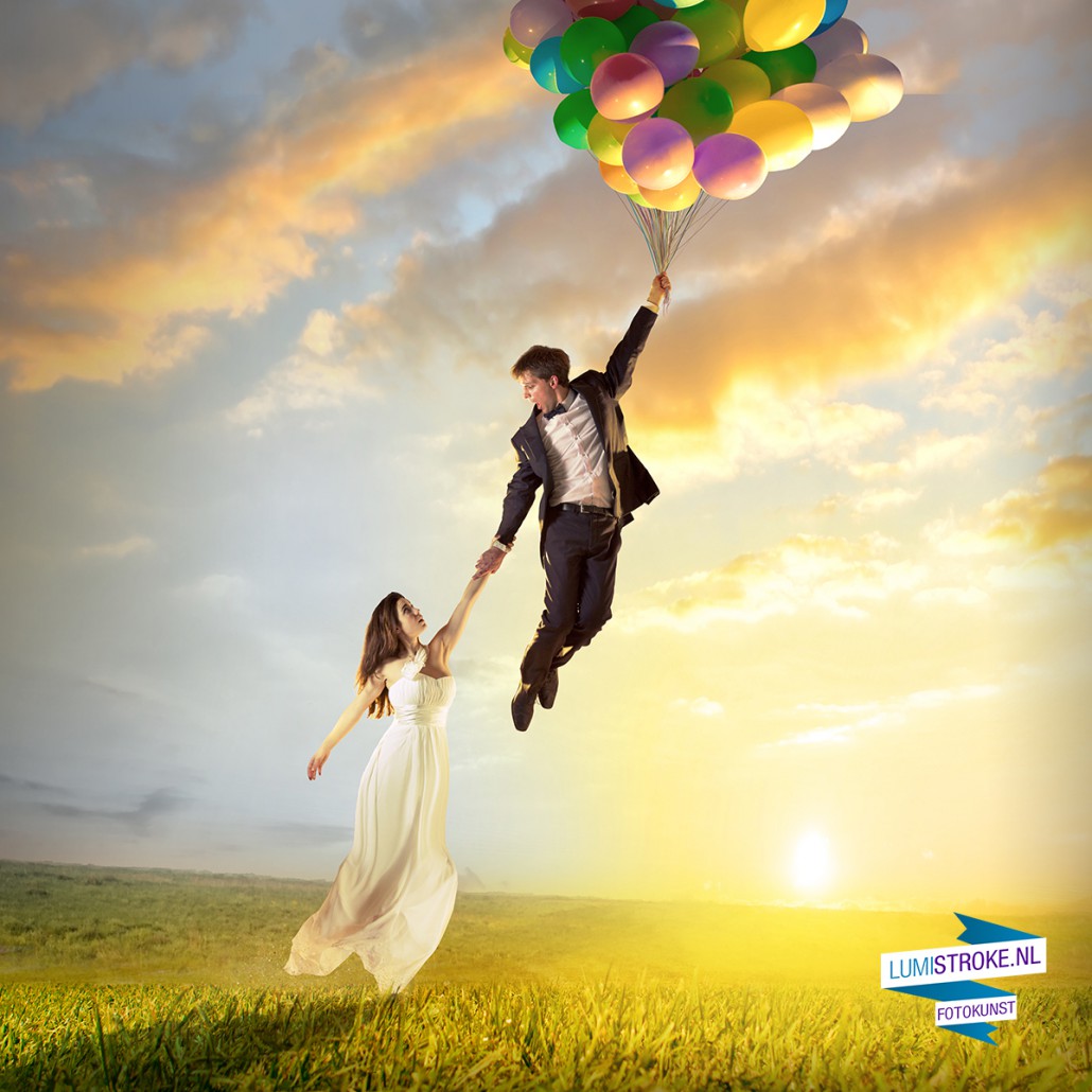 Happy birthday woman against the sky with rainbow-colored air ba